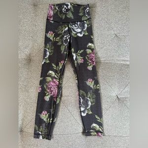 Lululemon ankle length leggings. Size 4. Charcoal gray with floral print